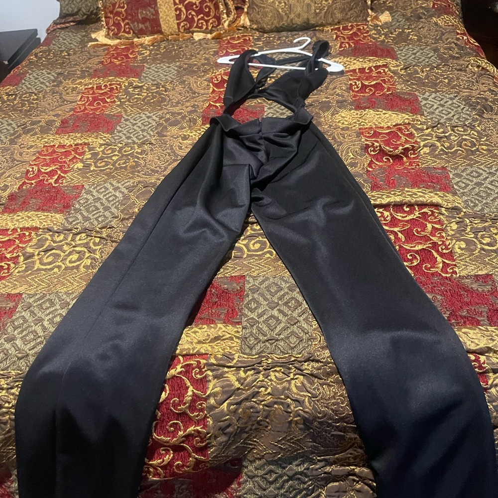 Black pantset with the back out. Perfect for parties